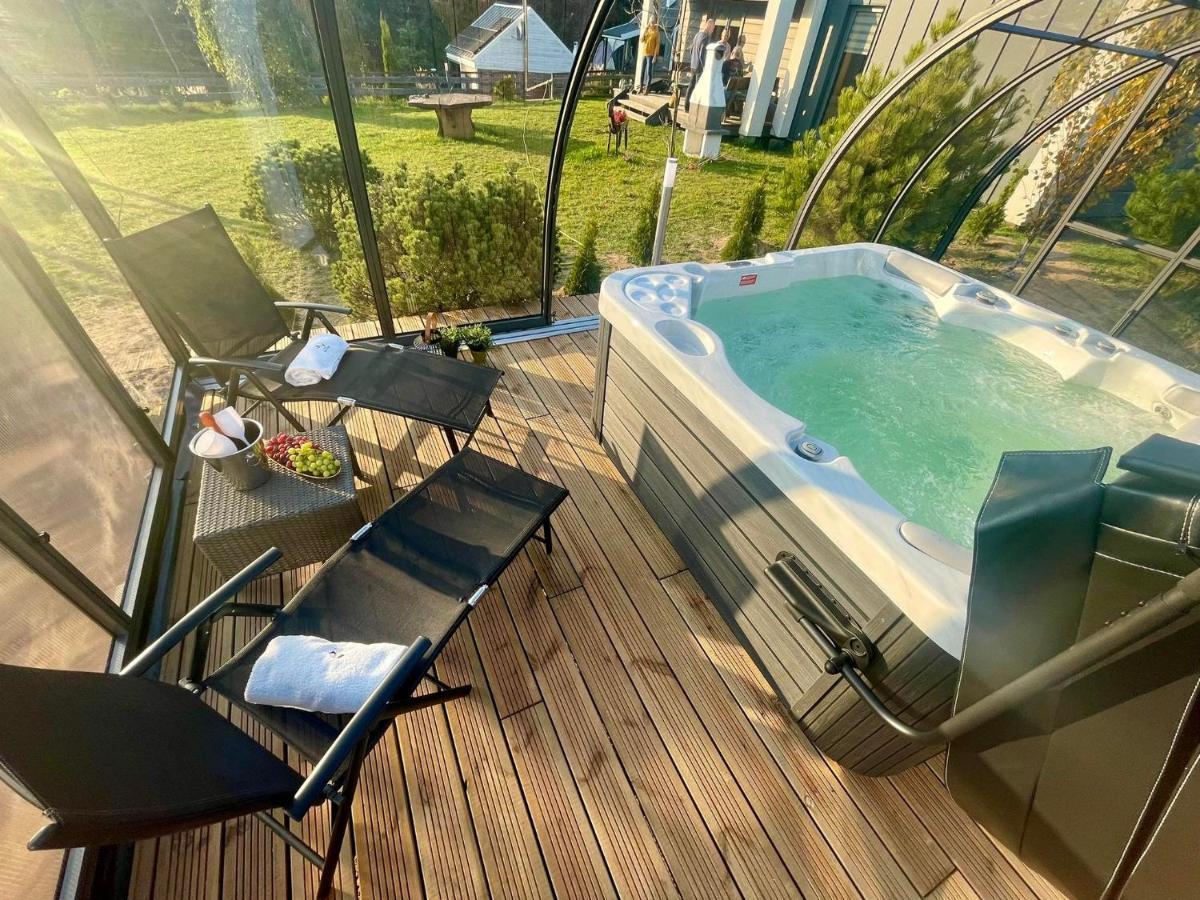 Osada Skoczkowo Komfortowe Domki Z Jacuzzi Nad Jeziorem- Sauna- Balia- Prywatny Staw Wedkarski Podiazy المظهر الخارجي الصورة